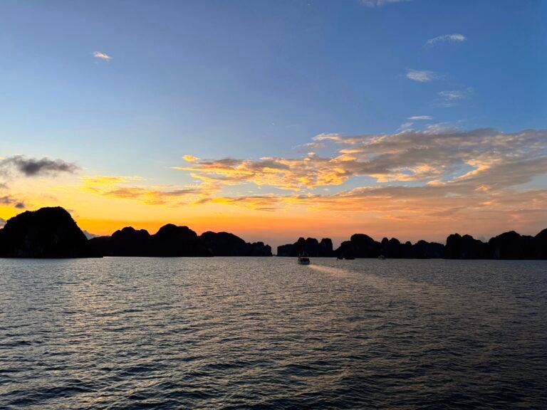 Limestone islands and boats in Ha Long Bay, Vietnam