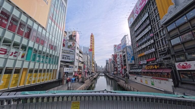 Dotonbori canal and streets in Osaka during the day