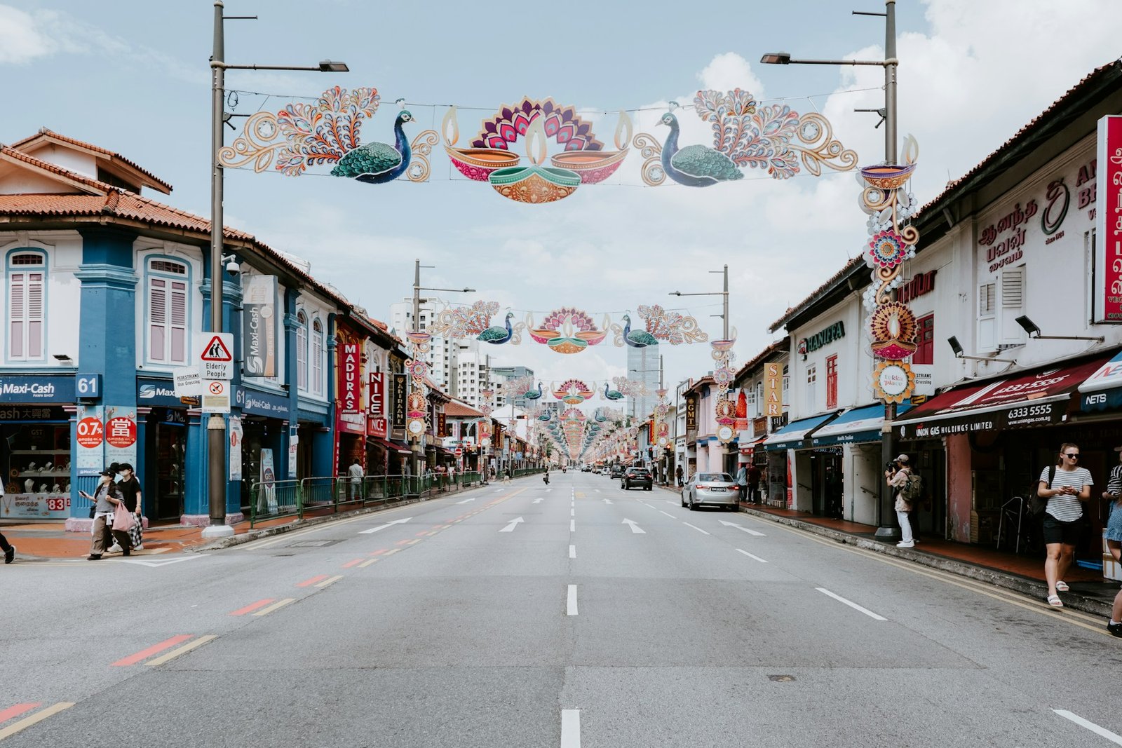 Little India street decorated with peacocks and oil-lamp motifs